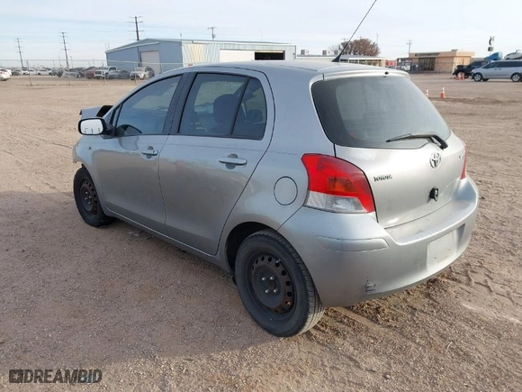 2010 Toyota Yaris with VIN JTDKT4K39A5316113, listed as a IAAI auction lot 41090164 with 163,661 mi miles. Bid and sale history available at carsss.com. Image 3.