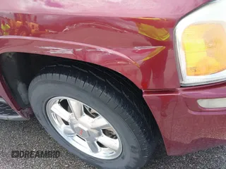 2003 GMC Envoy SLE z VIN 1GKDT13S732389048, wystawiony jako IAAI lot #42414696 z przebiegiem 215 253 mil mil oraz . Historia ofert i sprzedaży dostępna na DreamBid. Obrazek 6.