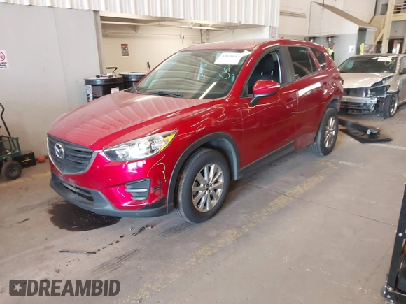 2016 Mazda CX-5 Sport z VIN JM3KE2BY3G0684861, wystawiony jako IAAI lot #42050897 z przebiegiem 165 688 mil mil oraz . Historia ofert i sprzedaży dostępna na DreamBid. Obrazek 2.