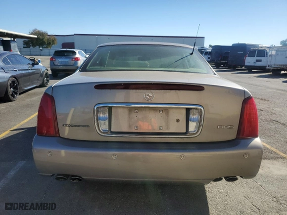 2003 Cadillac DeVille DHS with VIN 1G6KE57Y43U135615, listed as a Copart auction lot 76425404 with 169,505 mi miles and Clean Title. Bid and sale history available at carsss.com. Image 6.