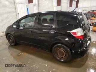 2009 Honda Fit with VIN JHMGE88259S053426, listed as a Copart auction lot 87894815 with 143,665 mi miles and Salvage Title. Bid and sale history available at carsss.com. Image 2.