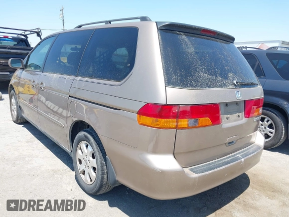 2003 Honda Odyssey EX-L with VIN 5FNRL18993B127164, listed as a IAAI auction lot 42474080 with 152,838 mi miles and . Bid and sale history available at DreamBid. Image 3.