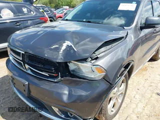 2014 Dodge Durango Limited with VIN 1C4RDJDG6EC477448, listed as a IAAI auction lot 41975706 with 183,430 mi miles and . Bid and sale history available at DreamBid. Image 6.