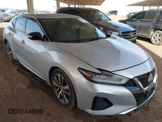 2020 Nissan Maxima SV z VIN 1N4AA6CV8LC361190, wystawiony jako IAAI lot #42225461 z przebiegiem 102 879 mil mil oraz . Historia ofert i sprzedaży dostępna na DreamBid. Obrazek 1.