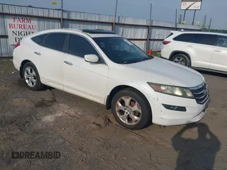 2010 Honda Crosstour EX-L z VIN 5J6TF1H51AL001055, wystawiony jako IAAI lot #42272313 z przebiegiem 228 485 mil mil oraz . Historia ofert i sprzedaży dostępna na DreamBid. Obrazek 1.