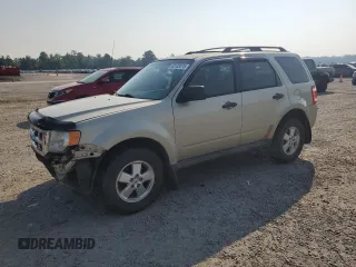 2011 Ford Escape XLS with VIN 1FMCU0C77BKC47917, listed as a Copart auction lot 62133075 with 311,556 mi miles and Salvage title. Bid and sale history available at DreamBid. Image 1.