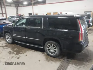 2015 GMC Yukon XL SLT with VIN 1GKS2HKC9FR175011, listed as a IAAI auction lot 41510519 with 194,136 mi miles. Bid and sale history available at carsss.com. Image 3.