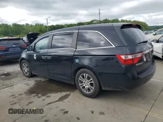 2013 Honda Odyssey EX-L with VIN 5FNRL5H61DB019930, listed as a Copart auction lot 54666775 with 175,300 mi miles and Salvage title. Bid and sale history available at DreamBid. Image 2.