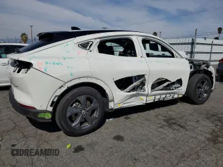 2023 Ford Mustang Mach-E Select with VIN 3FMTK1RM6PMA01062, listed as a Copart auction lot 49012225 with 36,977 mi miles and Salvage Title. Bid and sale history available at DreamBid. Image 3.