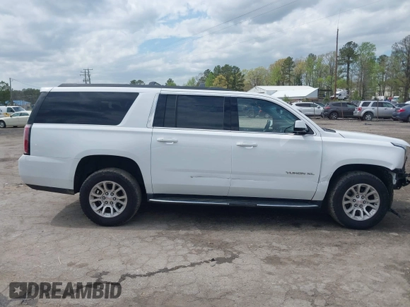 2019 GMC Yukon XL SLT with VIN 1GKS2GKC3KR160900, listed as a IAAI auction lot 41987464 with 88,854 mi miles and . Bid and sale history available at carsss.com. Image 13.