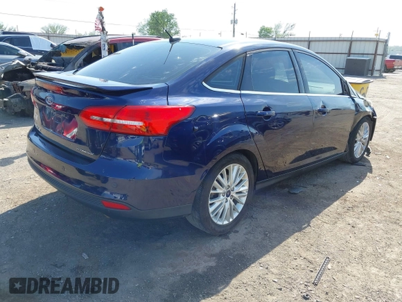 2017 Ford Focus Titanium with VIN 1FADP3J29HL204892, listed as a IAAI auction lot 42032705 with 119,028 mi miles and . Bid and sale history available at DreamBid. Image 4.