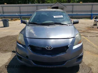 2009 Toyota Yaris z VIN JTDBT903191307764, wystawiony jako Copart lot #53498945 z przebiegiem 212 530 mil mil oraz Szkody całkowita. Historia ofert i sprzedaży dostępna na DreamBid. Obrazek 5.
