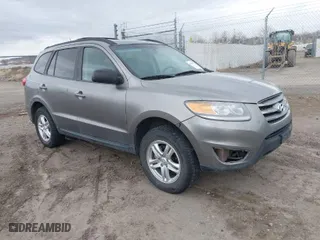 2012 Hyundai Santa Fe GLS with VIN 5XYZGDAB2CG161782, listed as a IAAI auction lot 41867287 with 216,971 mi miles. Bid and sale history available at carsss.com. Image 1.