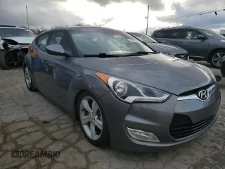 2014 Hyundai Veloster RE:FLEX z VIN KMHTC6AD2EU216453, wystawiony jako Copart lot #87090324 z przebiegiem 147 771 mil mil oraz Czysty tytuł • Clean title. Historia ofert i sprzedaży dostępna na DreamBid. Obrazek 4.