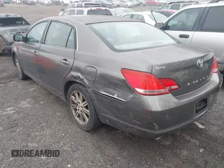 2007 Toyota Avalon XL with VIN 4T1BK36B47U171569, listed as a IAAI auction lot 41800454 with 237,627 mi miles. Bid and sale history available at carsss.com. Image 3.