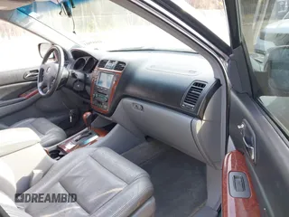 2004 Acura MDX with VIN 2HNYD18204H562124, listed as a IAAI auction lot 41453903 with 146,999 mi miles. Bid and sale history available at carsss.com. Image 5.