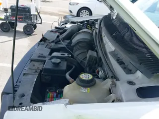 2007 Ford Econoline Cargo Commercial z VIN 1FTNE24L57DA53187, wystawiony jako IAAI lot #42302365 z przebiegiem Nie podano mil oraz . Historia ofert i sprzedaży dostępna na DreamBid. Obrazek 19.