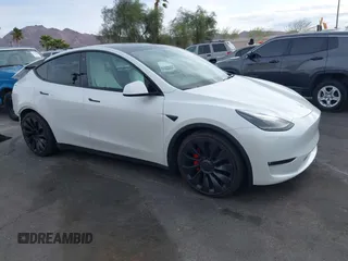 2023 Tesla Model Y Performance with VIN 7SAYGDEFXPF589477, listed as a IAAI auction lot 41936981 with 28,993 mi miles and . Bid and sale history available at DreamBid. Image 1.