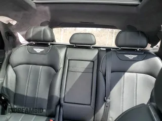 2020 Bentley Bentayga V8 z VIN SJAAM2ZV2LC028213, wystawiony jako Copart lot #52550255 z przebiegiem 50 238 mil mil oraz Szkody całkowita. Historia ofert i sprzedaży dostępna na DreamBid. Obrazek 10.