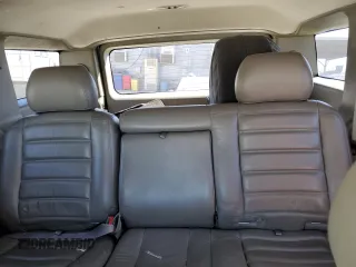 2003 Hummer H2 with VIN 5GRGN23U93H132656, listed as a Copart auction lot 71987404 with 152,287 mi miles and Salvage Title. Bid and sale history available at carsss.com. Image 10.