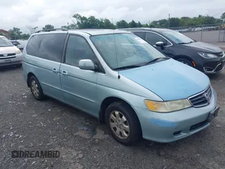 2004 Honda Odyssey EX-L with VIN 5FNRL18974B036430, listed as a IAAI auction lot 42715287 with 230,646 mi miles and . Bid and sale history available at DreamBid. Image 1.