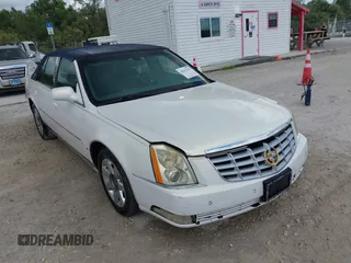 2007 Cadillac DTS Luxury I z VIN 1G6KD57Y57U113874, wystawiony jako IAAI lot #42291767 z przebiegiem 123 825 mil mil oraz . Historia ofert i sprzedaży dostępna na DreamBid. Obrazek 1.