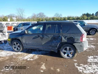 2017 Jeep Compass Latitude with VIN 1C4NJDEB5HD165566, listed as a IAAI auction lot 41290480 with 107,267 mi miles and . Bid and sale history available at DreamBid. Image 14.