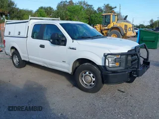 2017 Ford F-150 XL with VIN 1FTEX1EP7HFC92297, listed as a IAAI auction lot 41606955 with 197,656 mi miles. Bid and sale history available at carsss.com. Image 1.