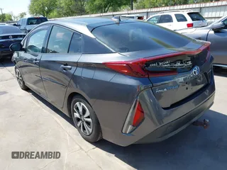 2018 Toyota Prius Plus with VIN JTDKARFP0J3101473, listed as a IAAI auction lot 41857956 with 110,020 mi miles and . Bid and sale history available at DreamBid. Image 3.