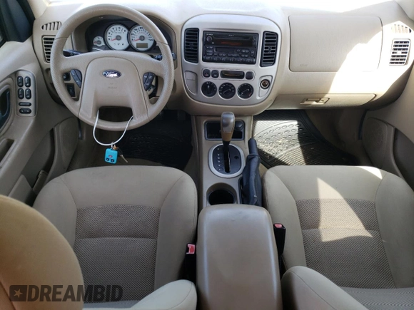 2005 Ford Escape XLT with VIN 1FMYU93105KC50944, listed as a Copart auction lot 50500965 with 133,532 mi miles and Salvage Title. Bid and sale history available at DreamBid. Image 8.