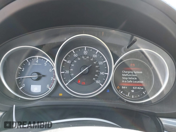 2018 Mazda CX-5 Grand Touring with VIN JM3KFADM8J0373368, listed as a IAAI auction lot 42013535 with 63,142 mi miles and . Bid and sale history available at DreamBid. Image 7.