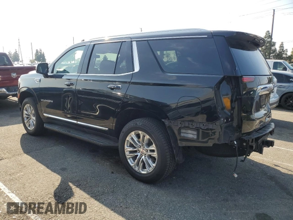 2021 GMC Yukon SLT with VIN 1GKS1BKD0MR395515, listed as a Copart auction lot 42810935 with 54,071 mi miles and Salvage Title. Bid and sale history available at carsss.com. Image 2.