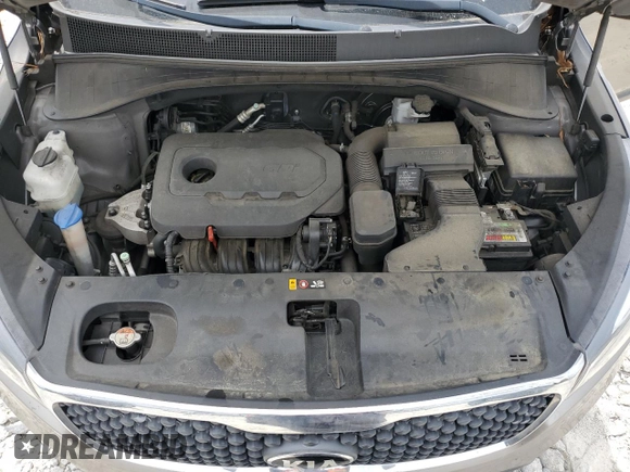 2018 Kia Sorento LX z VIN 5XYPG4A31JG406679, wystawiony jako Copart lot #55087315 z przebiegiem 146 171 mil mil oraz Szkoda całkowita • Salvage title. Historia ofert i sprzedaży dostępna na DreamBid. Obrazek 12.