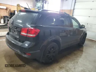 2013 Dodge Journey Crew with VIN 3C4PDCCG4DT693869, listed as a Copart auction lot 63666684 with 134,424 mi miles and Salvage title. Bid and sale history available at DreamBid. Image 3.