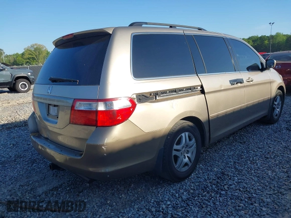 2006 Honda Odyssey EX with VIN 5FNRL38456B428213, listed as a IAAI auction lot 42036797 with 220,556 mi miles. Bid and sale history available at carsss.com. Image 4.