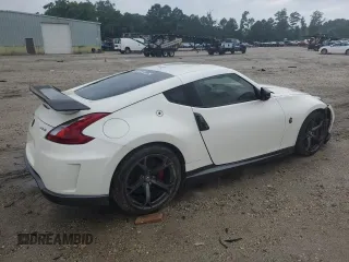 2014 Nissan 370Z with VIN JN1AZ4EH2EM633845, listed as a Copart auction lot 63583194 with 0 mi miles and Salvage Title. Bid and sale history available at carsss.com. Image 3.