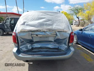 2005 Dodge Caravan SXT with VIN 2D4GP44L75R193138, listed as a IAAI auction lot 42073429 with 206,915 mi miles and . Bid and sale history available at DreamBid. Image 16.
