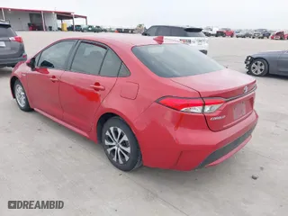 2020 Toyota Corolla Hybrid LE with VIN JTDEBRBE0LJ001001, listed as a IAAI auction lot 41536845 with 394,243 mi miles. Bid and sale history available at carsss.com. Image 3.