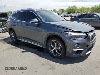 2016 BMW X1 xDrive28i z VIN WBXHT3C34GP883767, wystawiony jako Copart lot #56708375 z przebiegiem 96 285 mil mil oraz Szkoda całkowita • Salvage title. Historia ofert i sprzedaży dostępna na DreamBid. Obrazek 4.