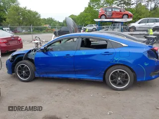 2017 Honda Civic LX with VIN 19XFC2F53HE217867, listed as a IAAI auction lot 42296194 with 104,670 mi miles and . Bid and sale history available at DreamBid. Image 14.