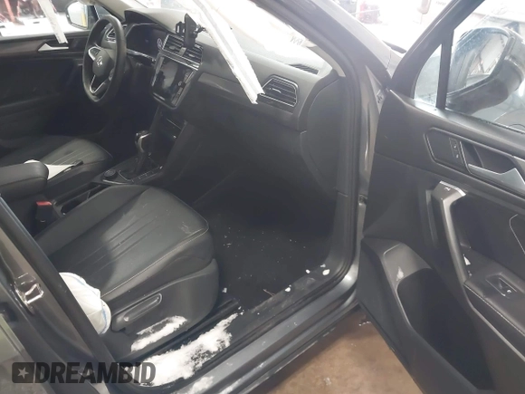 2023 Volkswagen Tiguan SE with VIN 3VVMB7AX5PM013447, listed as a IAAI auction lot 41615200 with 66,259 mi miles and . Bid and sale history available at DreamBid. Image 5.