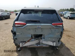 2022 Toyota RAV4 Hybrid XLE Premium with VIN 4T3B6RFV8NU101319, listed as a Copart auction lot 60987535 with 100,070 mi miles and Salvage title. Bid and sale history available at DreamBid. Image 6.