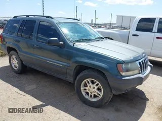2003 Jeep Grand Cherokee Laredo z VIN 1J4GW48S53C571247, wystawiony jako IAAI lot #42416174 z przebiegiem 175 328 mil mil oraz . Historia ofert i sprzedaży dostępna na DreamBid. Obrazek 1.