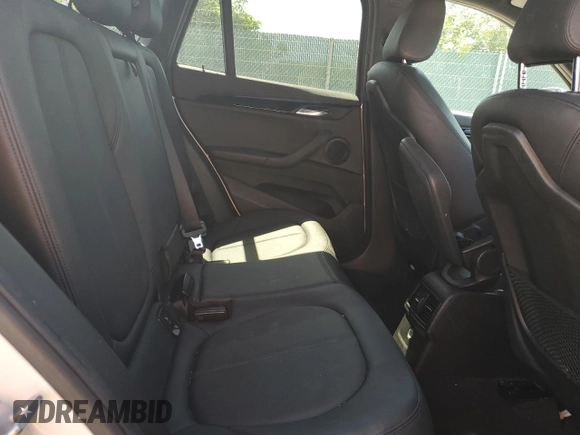 2018 BMW X1 sDrive28i with VIN WBXHU7C38J5H44459, listed as a Copart auction lot 49107553 with 96,494 mi miles and . Bid and sale history available at DreamBid. Image 11.