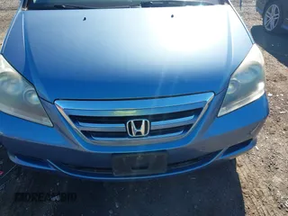 2007 Honda Odyssey EX-L with VIN 5FNRL38707B051950, listed as a IAAI auction lot 42175286 with 125,818 mi miles. Bid and sale history available at carsss.com. Image 6.