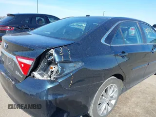 2015 Toyota Camry LE z VIN 4T1BD1FK8FU148065, wystawiony jako IAAI lot #41843278 z przebiegiem 91 137 mil mil oraz . Historia ofert i sprzedaży dostępna na DreamBid. Obrazek 6.