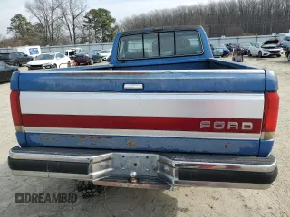 1990 Ford F-150 with VIN 1FTEF14N6LNB21235, listed as a Copart auction lot 46149815 with 76,777 mi miles and Salvage Title. Bid and sale history available at carsss.com. Image 6.