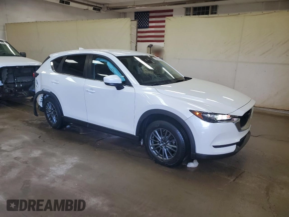 2019 Mazda CX-5 Touring with VIN JM3KFBCM1K0697500, listed as a Copart auction lot 46460735 with 69,412 mi miles and Salvage Title. Bid and sale history available at carsss.com. Image 4.