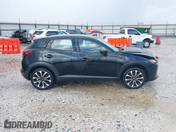 2019 Mazda CX-3 Touring with VIN JM1DKDC76K1406860, listed as a IAAI auction lot 40767122 with 162,636 mi miles. Bid and sale history available at carsss.com. Image 13.
