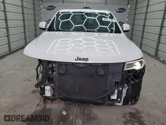 2022 Jeep Grand Cherokee WK Laredo X with VIN 1C4RJEAG1NC128279, listed as a Copart auction lot 70806244 with 104,478 mi miles and Salvage Title. Bid and sale history available at carsss.com. Image 5.